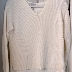 White rubbed sweater